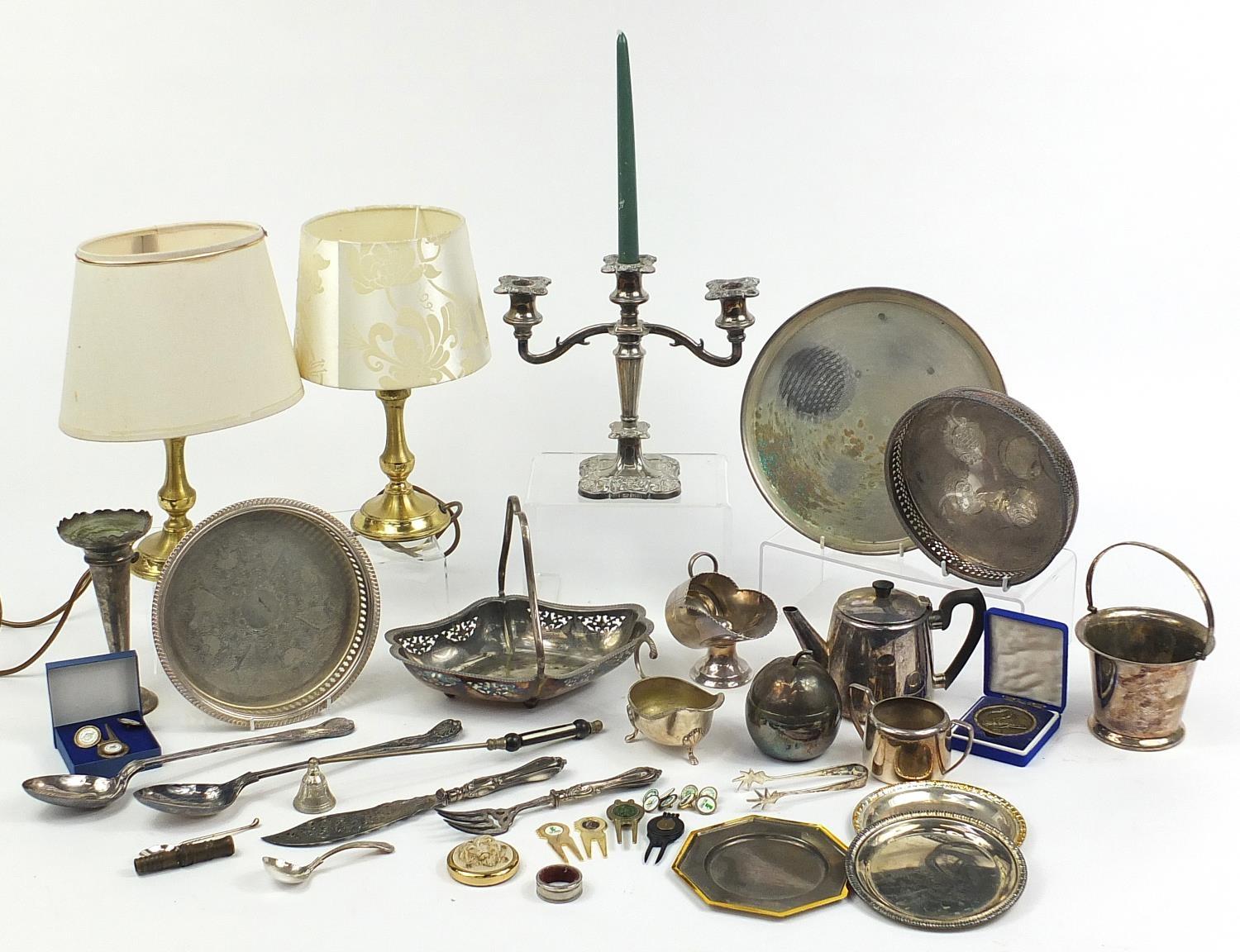 Metalware including silverplate, three branch candelabra and a pair of brass table lamps with shades