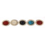 Five silver cabochon stone brooches including turquoise and mother of pearl, 2.8cm wide, 24.5g