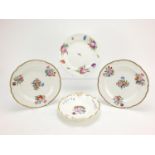 Three 19th century Spode plates hand painted with flowers and a shaped dish, the largest each 24.5cm