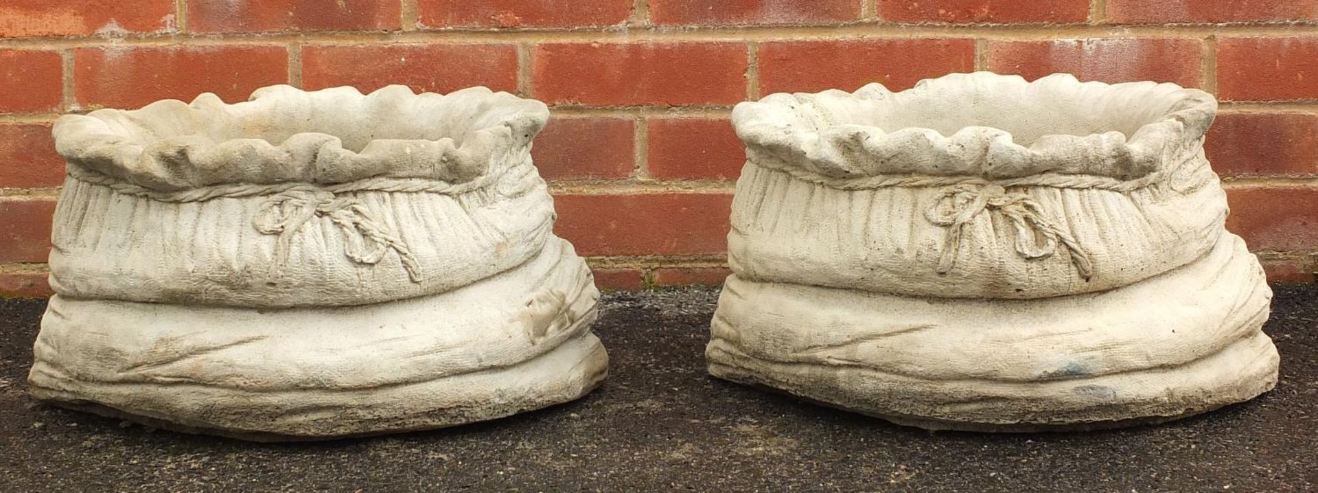 Pair of stoneware garden sack design planters, 25cm high x 40cm wide