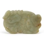 Chinese green and russet jade carving of a mythical animal, 9cm wide