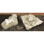 Stoneware garden figure of Putti and a Putti wall pocket, the largest 40cm wide
