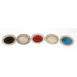 Five silver cabochon stone brooches including turquoise and mother of pearl, 2.8cm wide, 24.5g