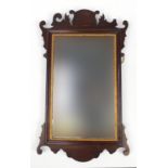 George III mahogany wall mirror with bevelled plate, 66.5cm high x 39.5cm wide