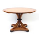 Circular inlaid yew wood dining table, 75cm high x 122cm in diameter