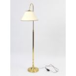 Adjustable brass standard lamp with shade, 155cm high