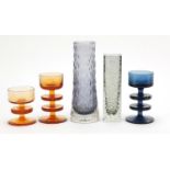 Art glassware comprising two Whitefriars vases and three Wedgwood candle holders designed by