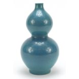 Chinese porcelain double gourd vase having a spotted turquoise glaze, 25.5cm high