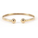 9ct gold bangle, 6cm wide, 5.7g