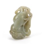 Chinese celadon and russet jade carving of a gourd vessel, 6.5cm high