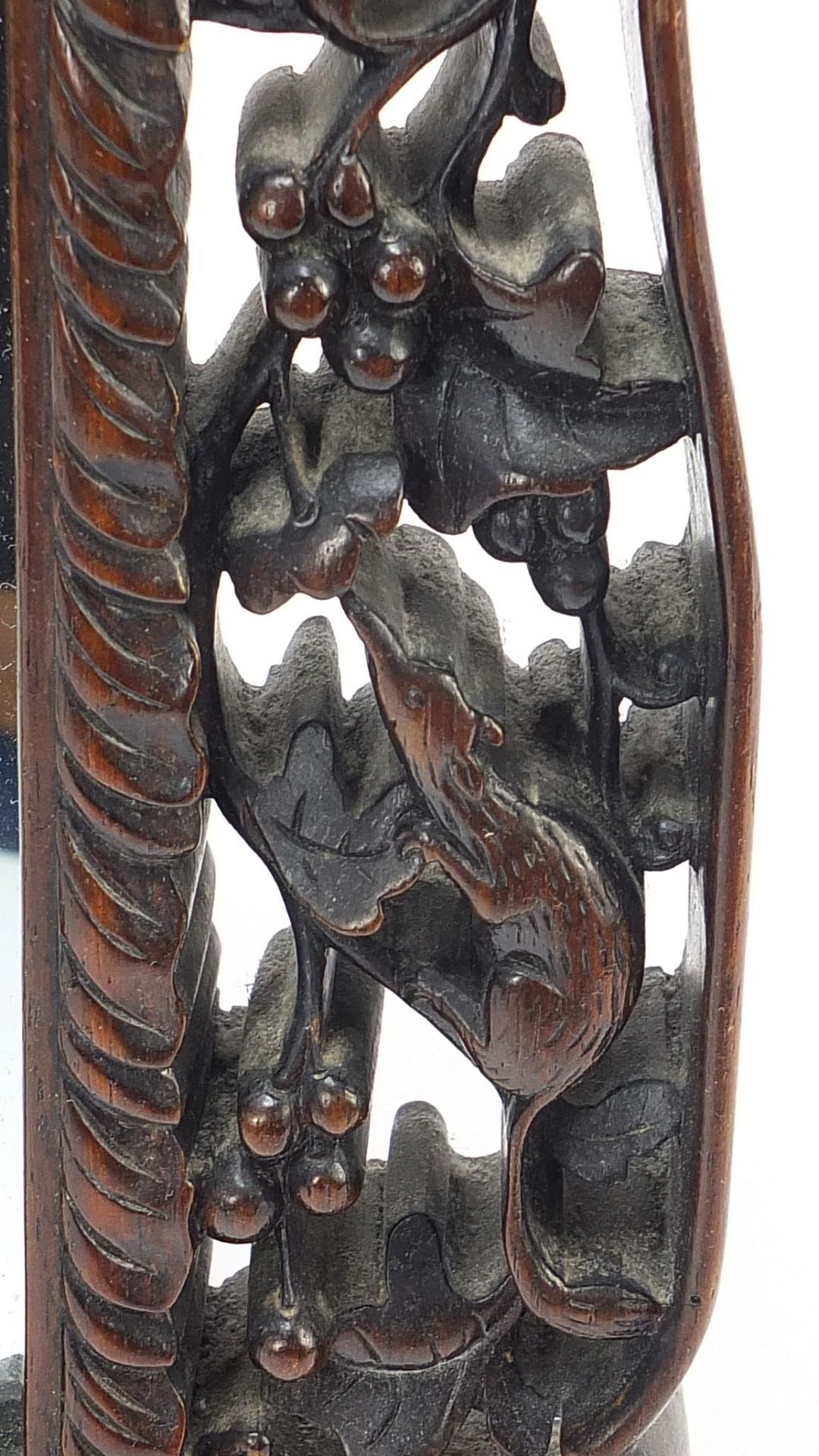 Chinese hardwood easel toilet mirror carved with bats, rats and mythical animals amongst berries and - Image 6 of 6