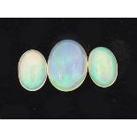 Three Ethiopian opal cabochons, the largest 9mm x 7mm, total approximately 2.0 carat