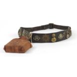 British military leather belt with cap badges, buttons and ARP first aid pouch, the belt 94.5cm in