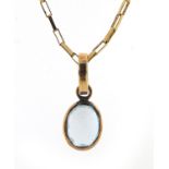 18ct gold blue sapphire pendant on a 9ct gold necklace, 1.8cm high and 44cm in length, total 3.2g