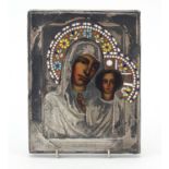 Russian hand painted icon of mother and child with embossed silver overlay and applied champlevé