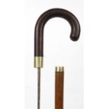 Malacca swordstick with leather handle and steel blade, 93cm in length
