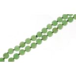 Chinese green jade bead necklace, 84cm in length, 156.0g
