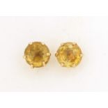 Pair of 9ct gold citrine stud earrings, 8mm in diameter, 1.2g