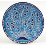 Persian Multan pottery plate hand painted with flowers, 32cm in diamter