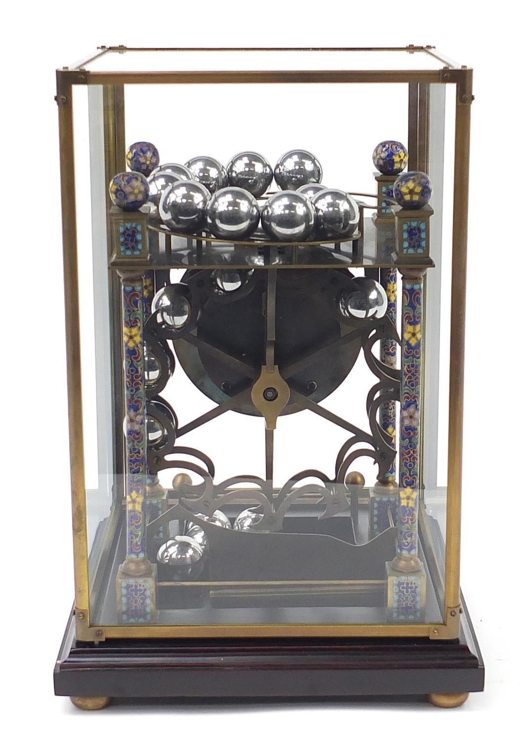 Champlevé enamel rolling ball clock with enamel dial having Roman numerals and glass display case, - Image 4 of 8