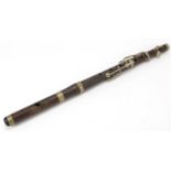 Henry Potter & Co of London four piece flute, 49.5cm in length