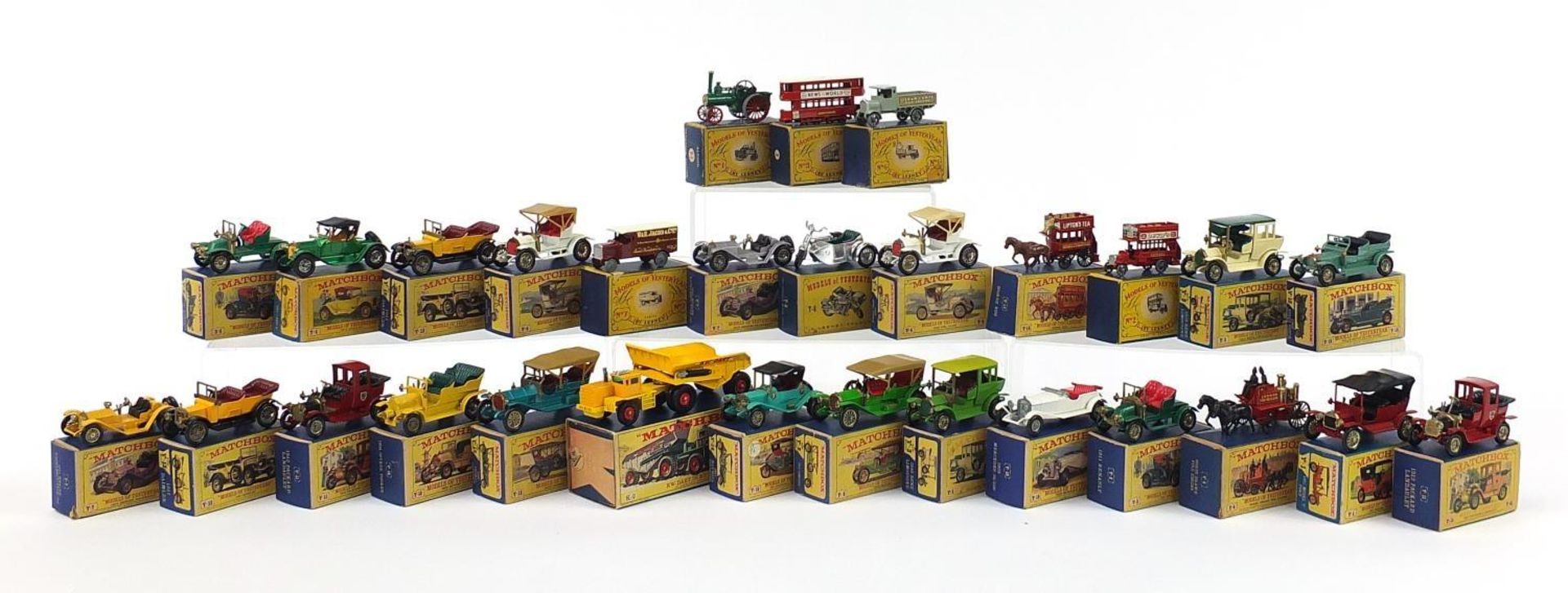 Twenty nine matchbox Models of Yesteryear die cast vehicles with boxes including KW-Dart dump