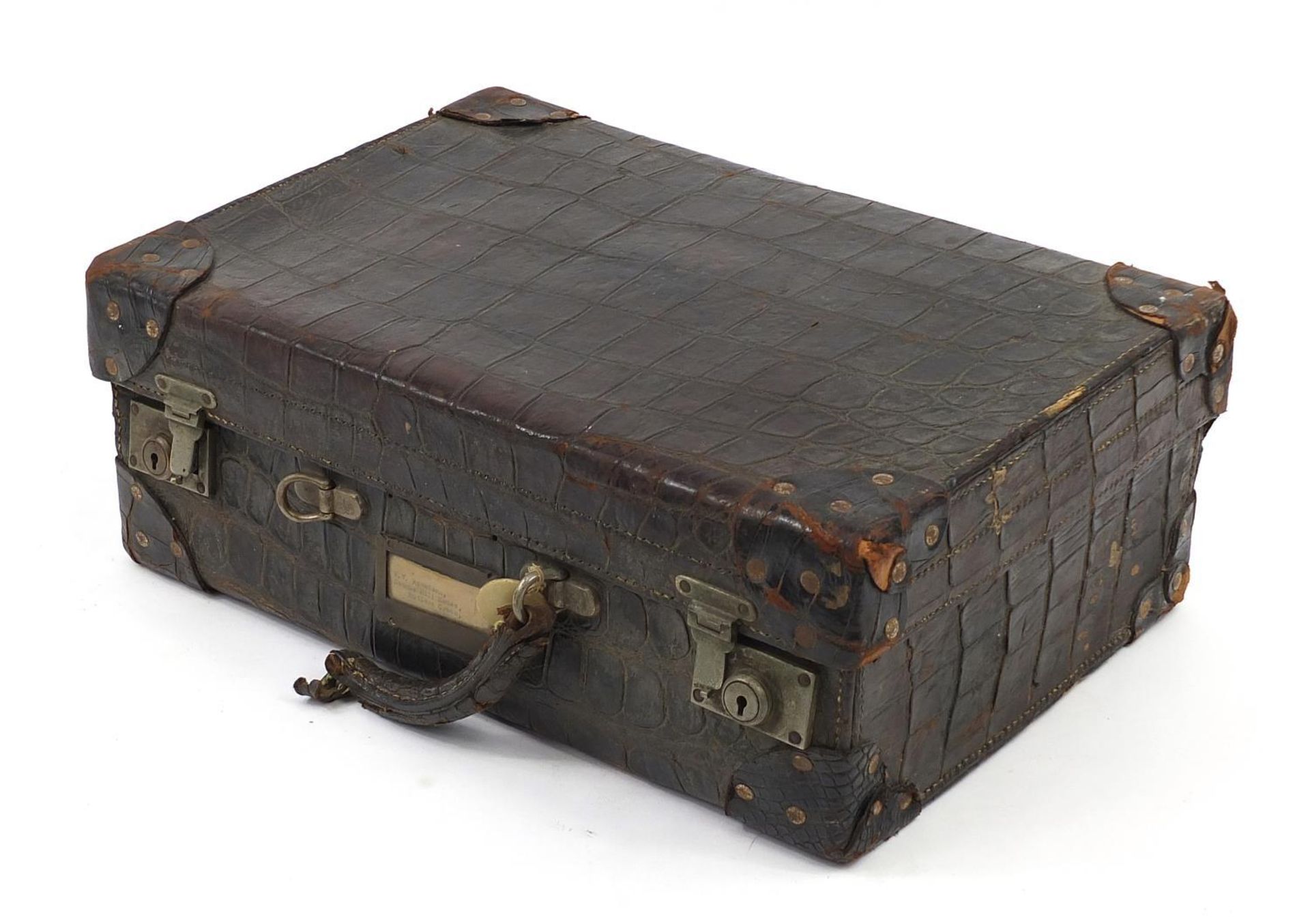 Early 20th century taxidermy interest crocodile skin suitcase, 34.5cm H x 51cm W x 17cm D