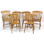 Six pine dining chairs including two carvers