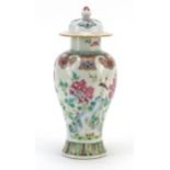Chinese porcelain baluster vase and cover hand painted in the famille rose palette with a bird