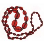 Amber coloured graduated facetted bead necklace, 72cm in length, 54.0g