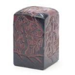 Large Chinese stone seal carved with figures in a landscape, character marks to the base, 16cm high