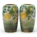 Pair of Royal Doulton Brangwyn ware vases, each numbered 5077, each 23.5cm high