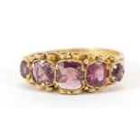 Victorian 15ct gold almandine garnet five stone ring with floral chased band, Birmingham 1873,