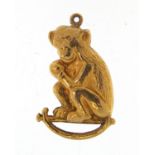 9ct gold seated monkey charm, 2.3cm high, 1.0g