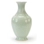 Chinese porcelain quatrefoil vase having a celadon glaze, decorated in relief with bats and fruit,