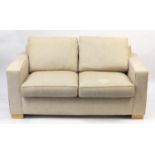 Contemporary beige upholstered sofa bed, 166cm wide
