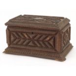 Anglo Indian carved hardwood table casket with velvet lined interior, 17.5cm H x 32cm W x 21cm D