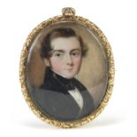 Georgian oval hand painted portrait miniature of a young gentleman housed in a gold coloured metal