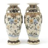 Pair of Japanese Satsuma pottery vases, each decorated with figures seated beside and Emperor,