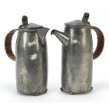 Archibald Knox for Liberty & Co, Arts & Crafts pewter coffee pot and jug, both numbered 0231, the