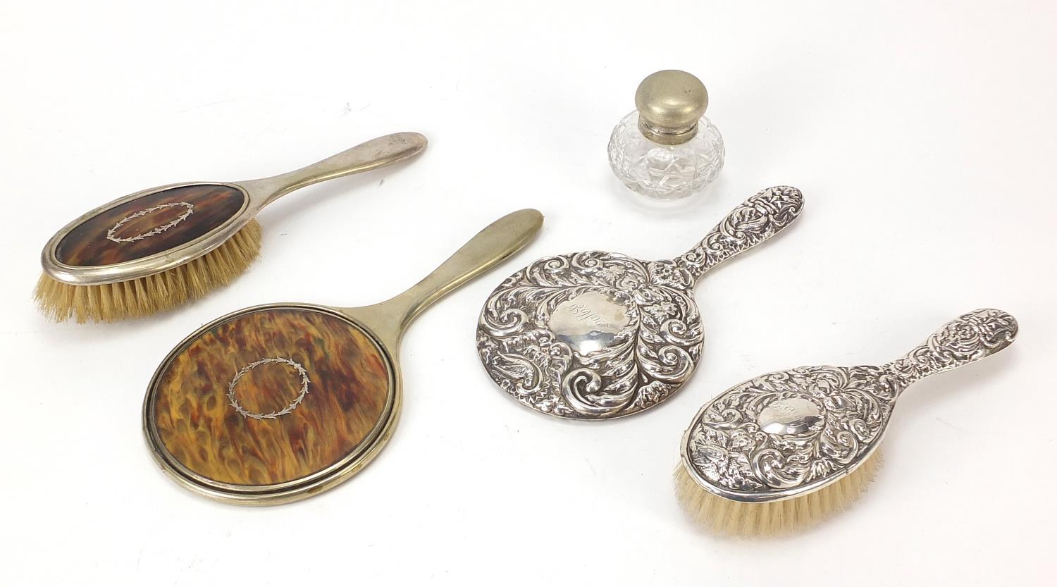 Vanity items including piqué work design hand mirror and brush and sterling silver hand mirror and