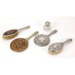 Vanity items including piqué work design hand mirror and brush and sterling silver hand mirror and