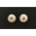 Pair of 9ct gold pink freshwater pearl stud earrings, 6.5mm in diameter, 0.9g