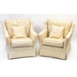 Peter Guild, pair of cream and gold floral upholstered armchairs, 85cm high