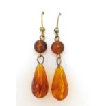 Pair of amber coloured drop earrings, 5cm high, 3.1g
