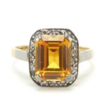 18ct gold orange stone and diamond ring, (tests as sapphire) size O, 4.6g