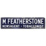 Vintage M Featherstone Newsagent & Tobacconist enamel advertising sign, 122cm x 30.5cm