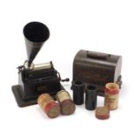 Thomas Edison oak cased phonograph with horn and three reels, 25cm wide excluding the handle