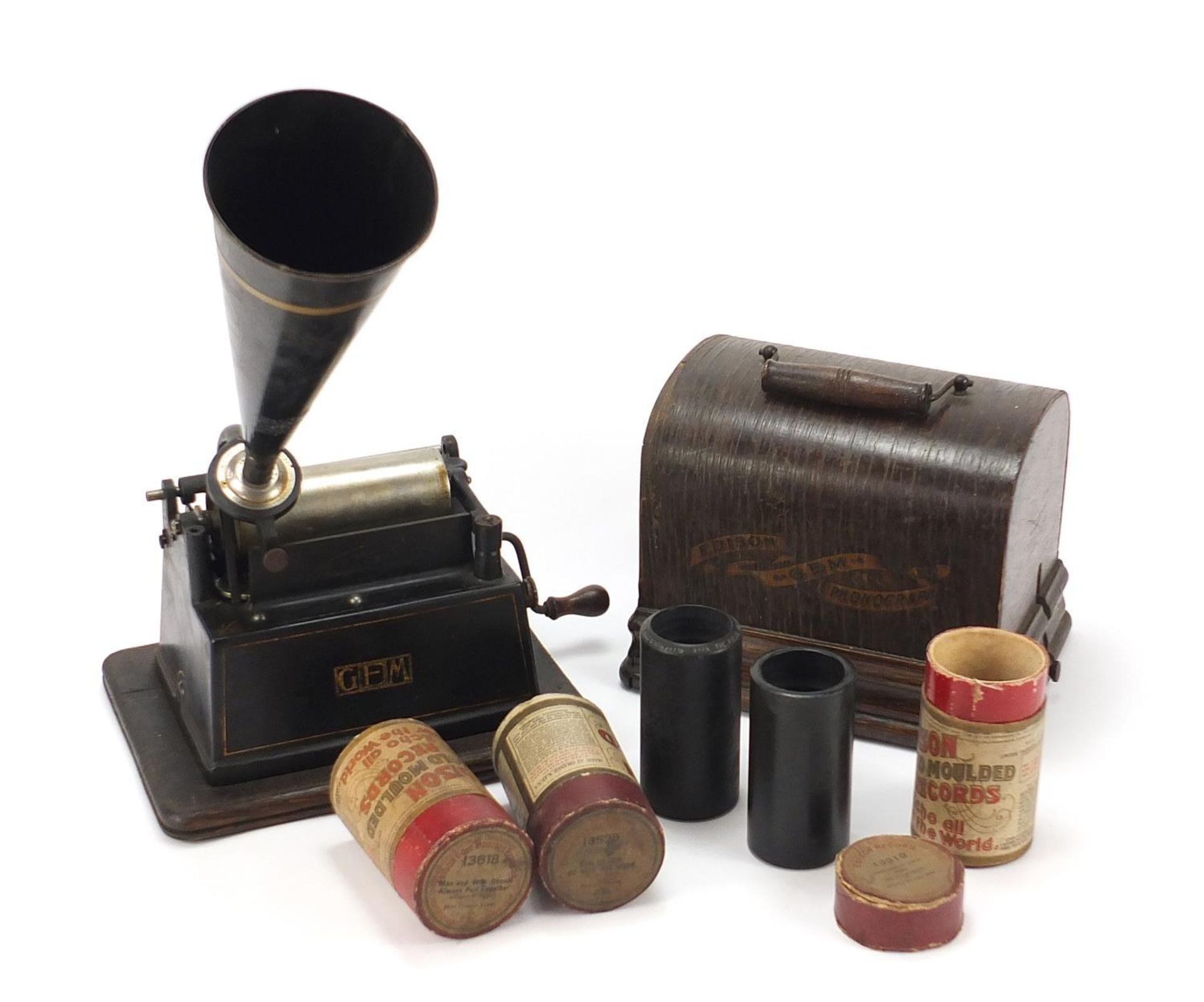 Thomas Edison oak cased phonograph with horn and three reels, 25cm wide excluding the handle