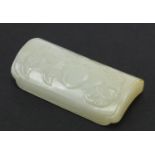 Chinese pale green jade scholar's wrist rest carved with a bat and peach, 6cm wide
